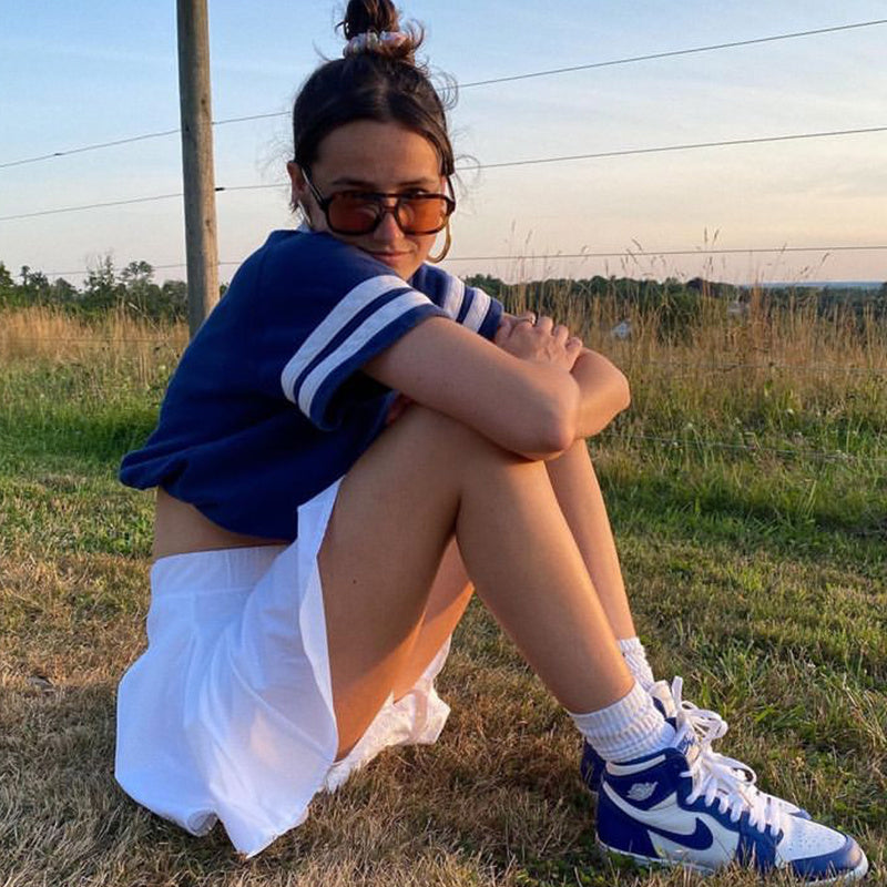 Rachel – Retro Marineblauw Polo Nek T-shirt met Korte Mouwen